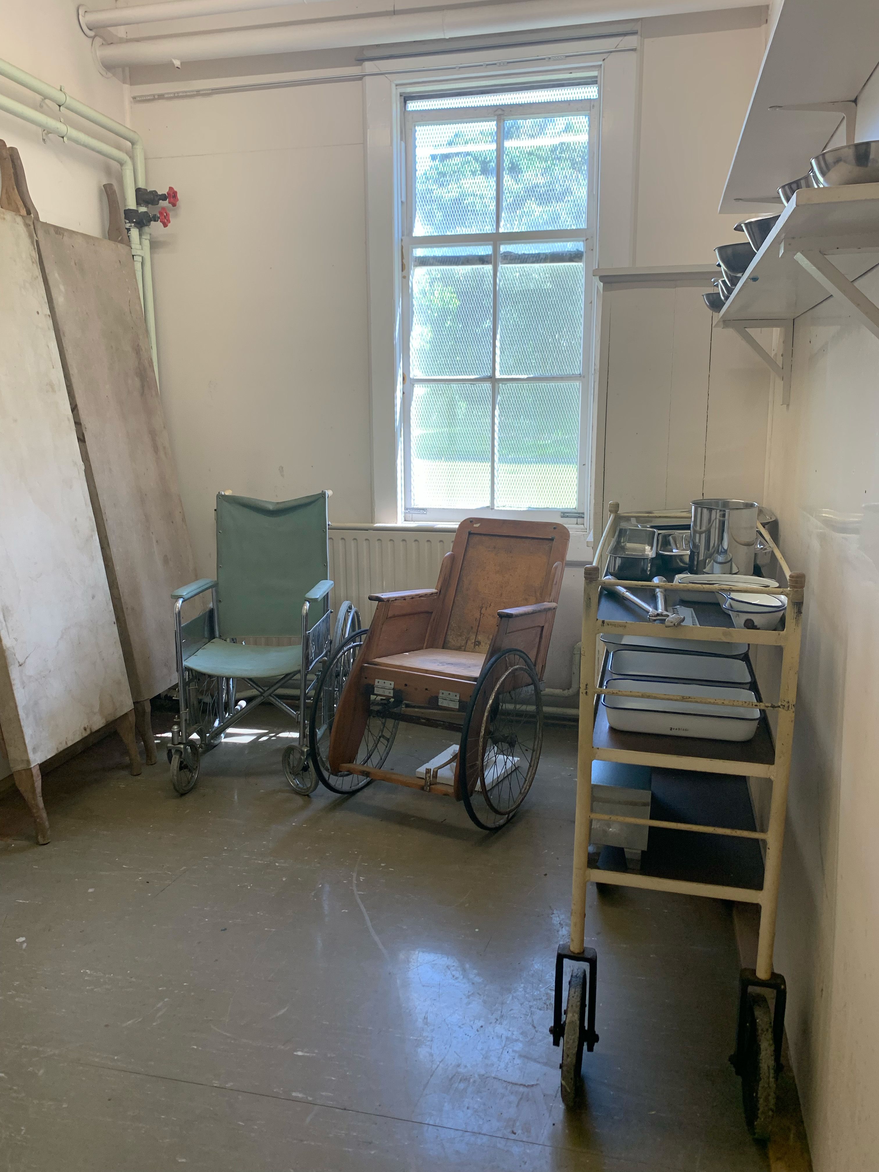 Old wheelchairs and hospital equipment