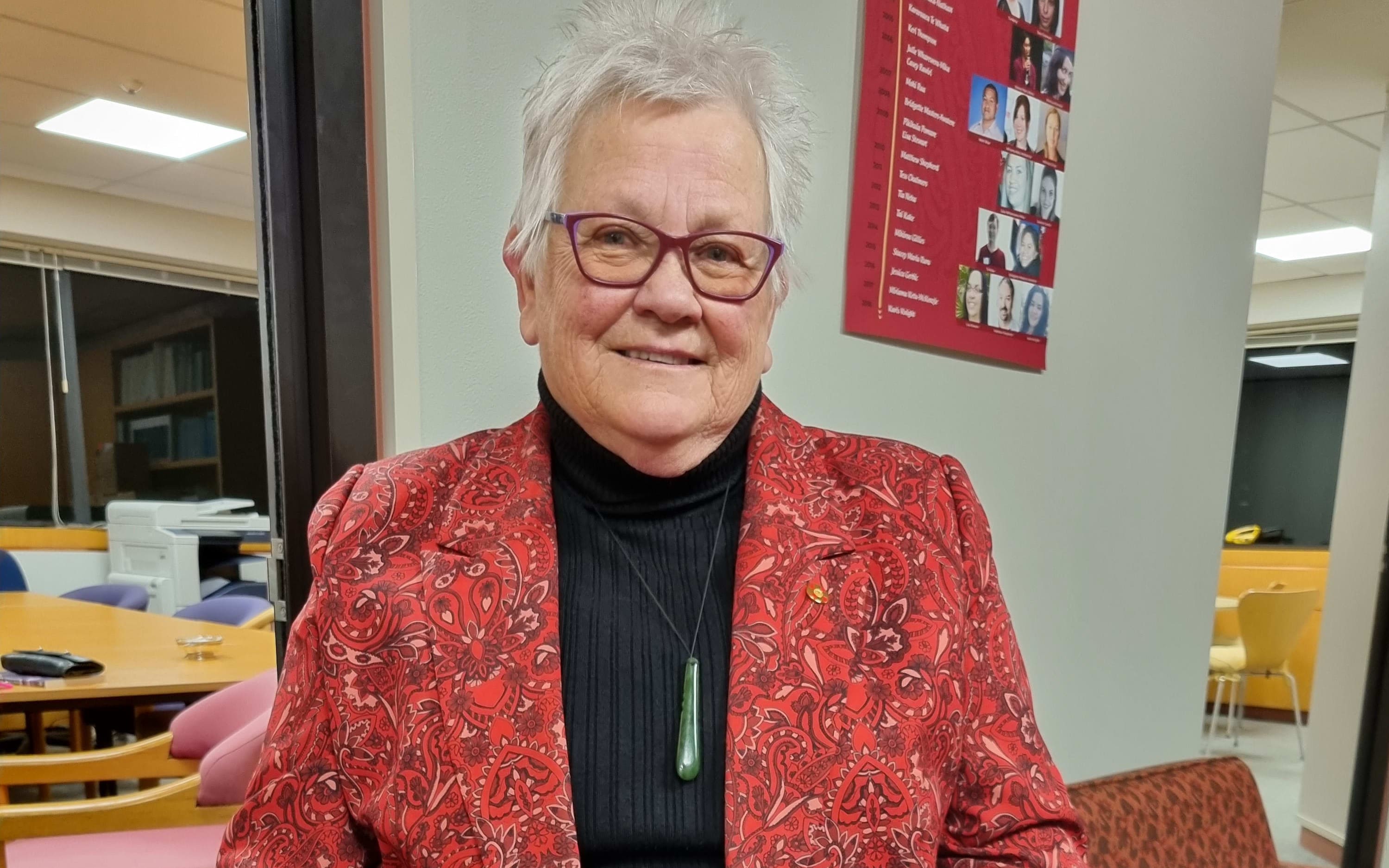 Dr Olive Webb smiles at camera