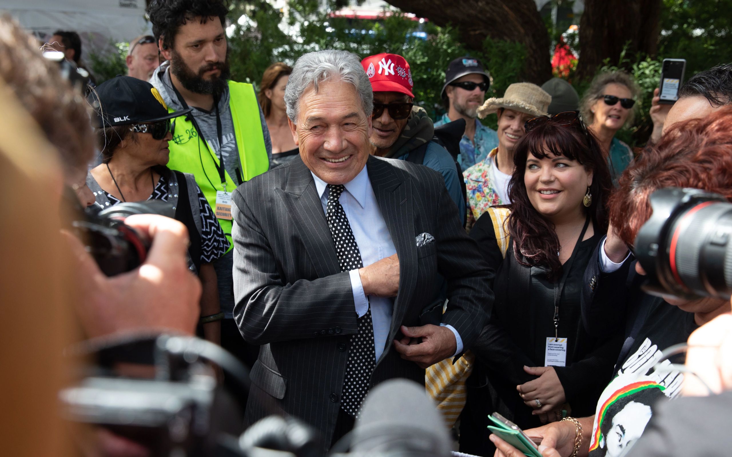Winston Peters greets crowd and media